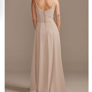 this dress is a size 2 brand new, never been worn.